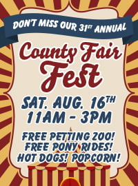 A poster for the County Fair Fest with circus-themed designs, listing event details and attractions.